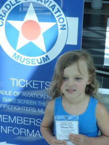 Girl at Cradle of Aviation Museum with Museum Pass